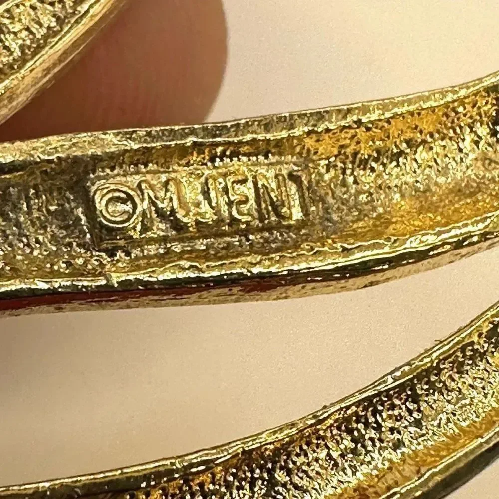 Mjent gold tone
